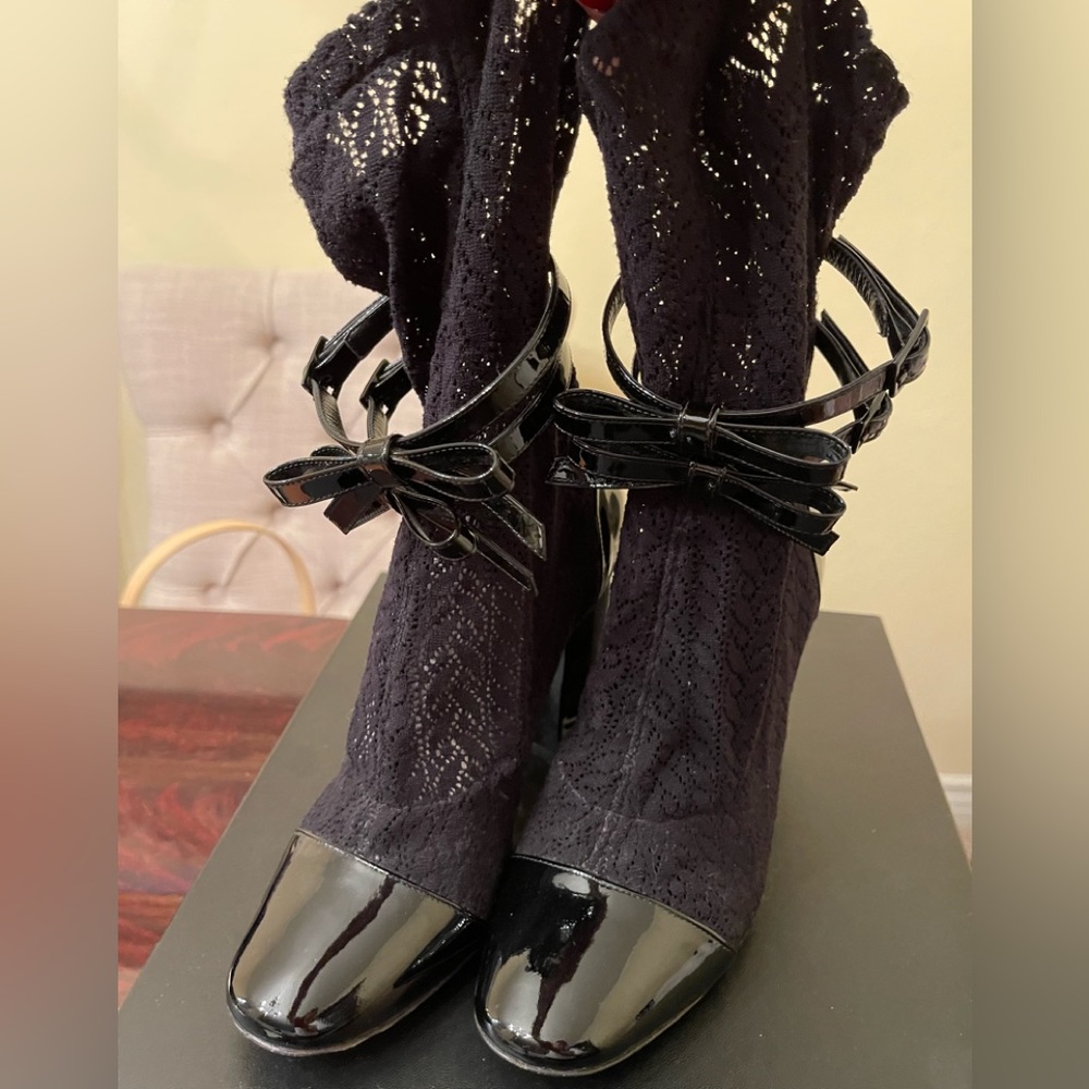Women’s fashion boots by Philosophy . Made in Italy.          Size US  7 .